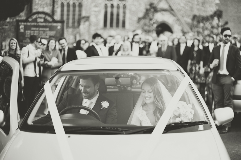 bride and groom in the car