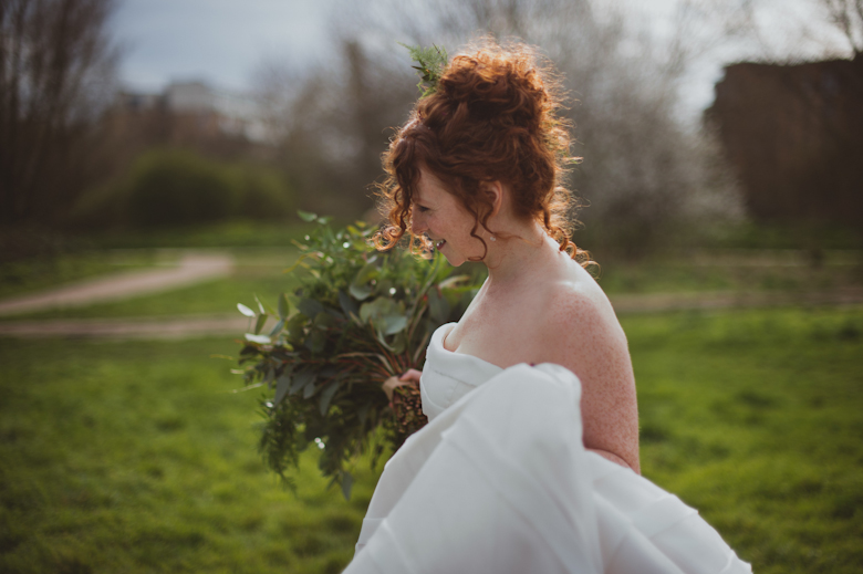 Core Clapton wedding, bride walking in the park