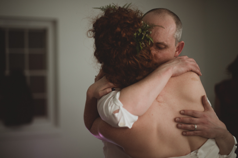 bride and groom hug