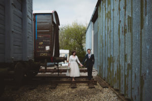 bride and groom with trains, Buckinghamshire Railway Centre Wedding