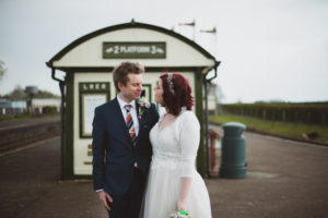 bride and groom looking at each other, Buckinghamshire Railway Centre Wedding