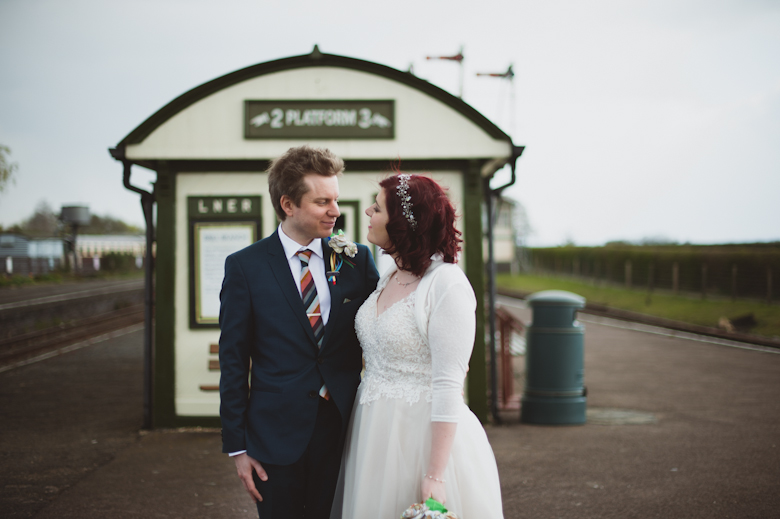 bride and groom looking at each other