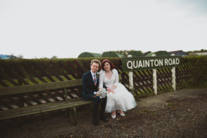bride and groom on the bench, Buckinghamshire Railway Centre Wedding
