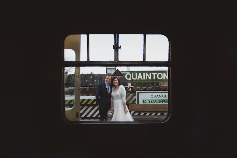 bride and groom outside the train