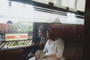 Railway wedding photography - bride and groom on the train, Buckinghamshire Railway Centre Wedding