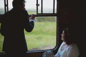 bride and groom on the train - Buckinghamshire Railway Centre Wedding