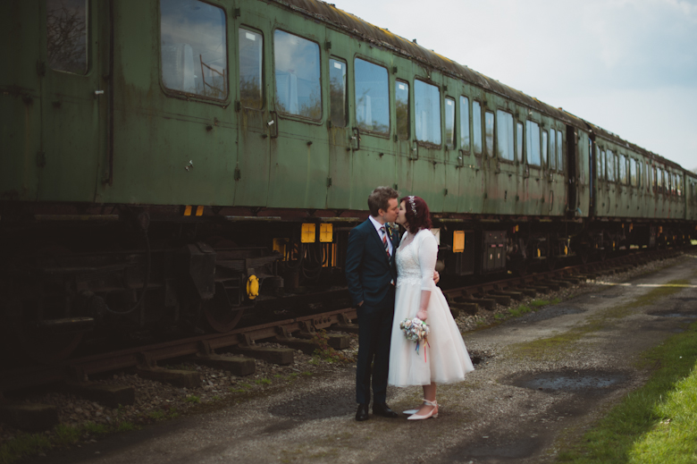 bride and groom with trains