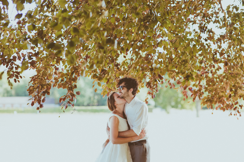 bride and groom kiss