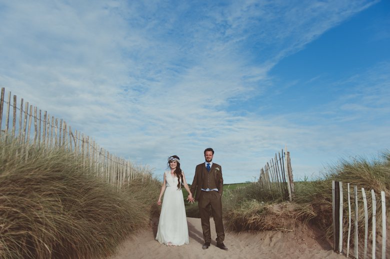 bride and groom at the beach