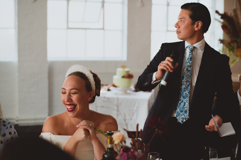 Groom's speech, bride laughing at the Bistrotheque, East London Wedding