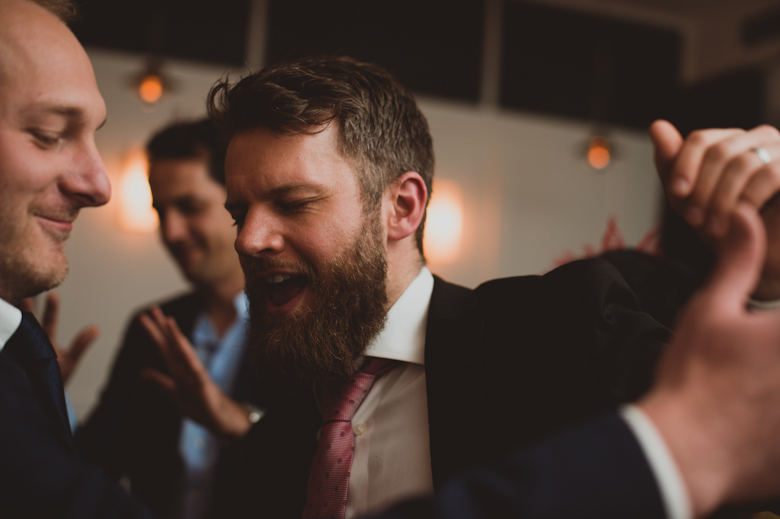 Guests dancing and singing at the wedding reception East London - Bistrotheque