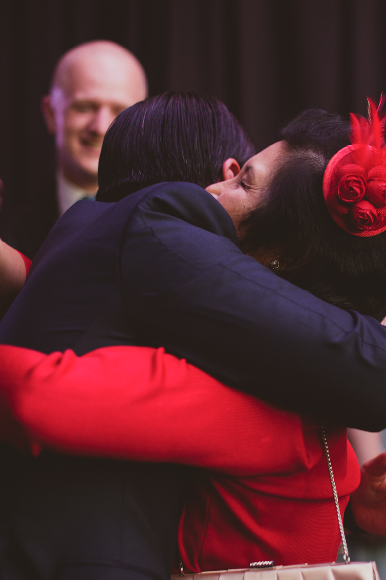 groom and mum hugging at the wedding at the Bistrotheque in Bethenal Green