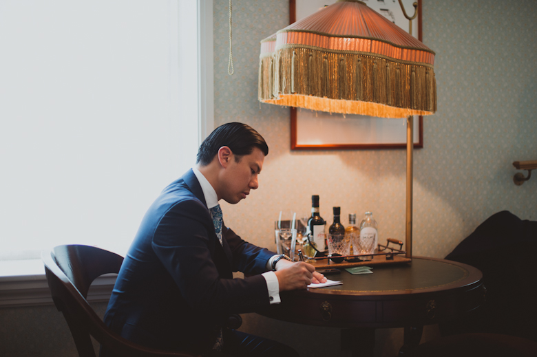 groom writing his speech - London wedding photography