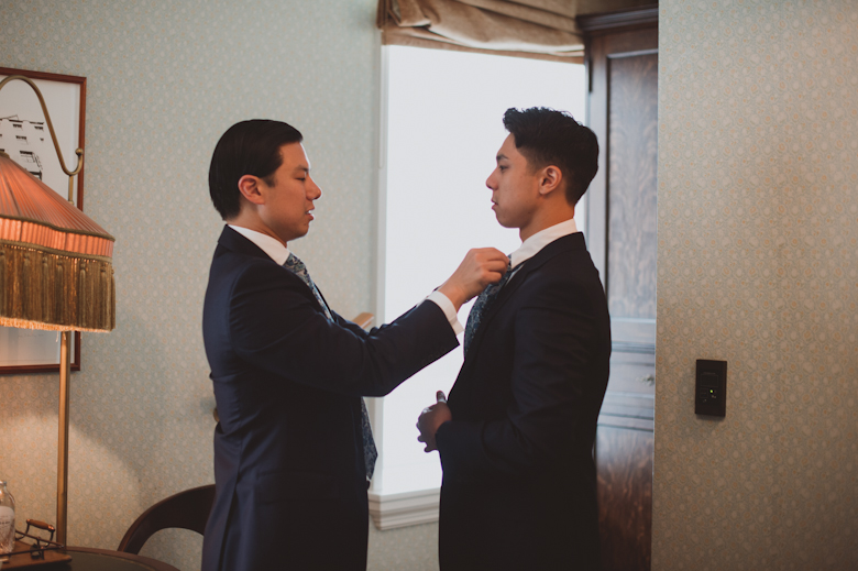 groom and brother getting ready