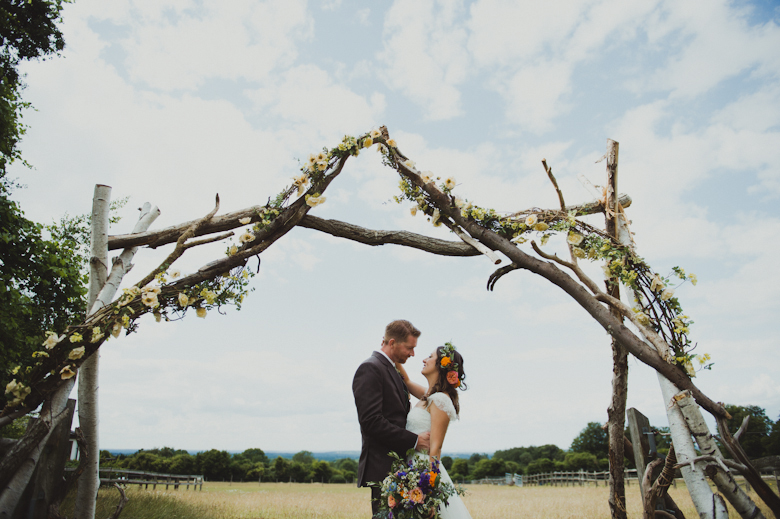 the kiss, outdoor ceremony festival wedding - Surrey wedding photography - festival photographer