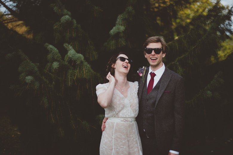 Bride and groom laugh, vintage wedding photography
