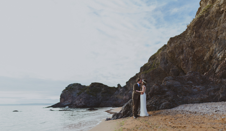 destination wedding photographer - couple on the beach