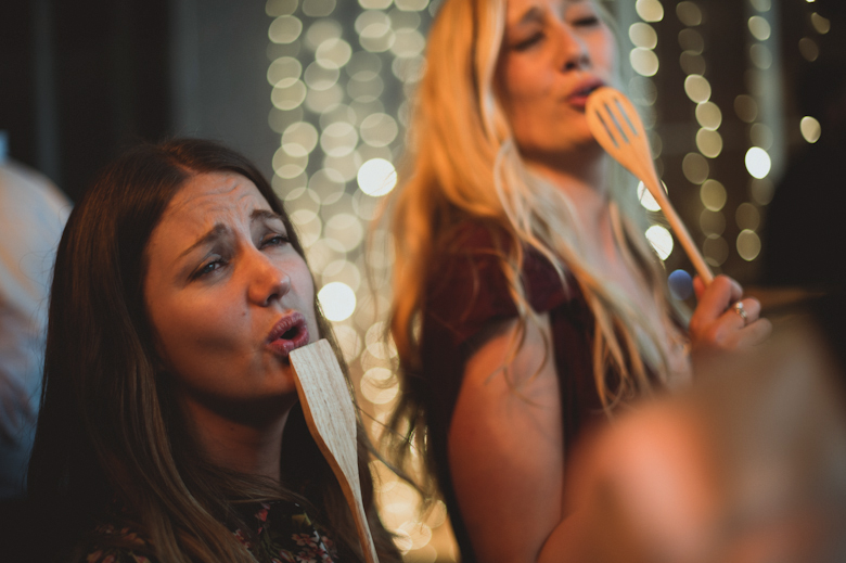 singing and dancing - warehouse wedding - Bride getting ready - London Wedding Photographer