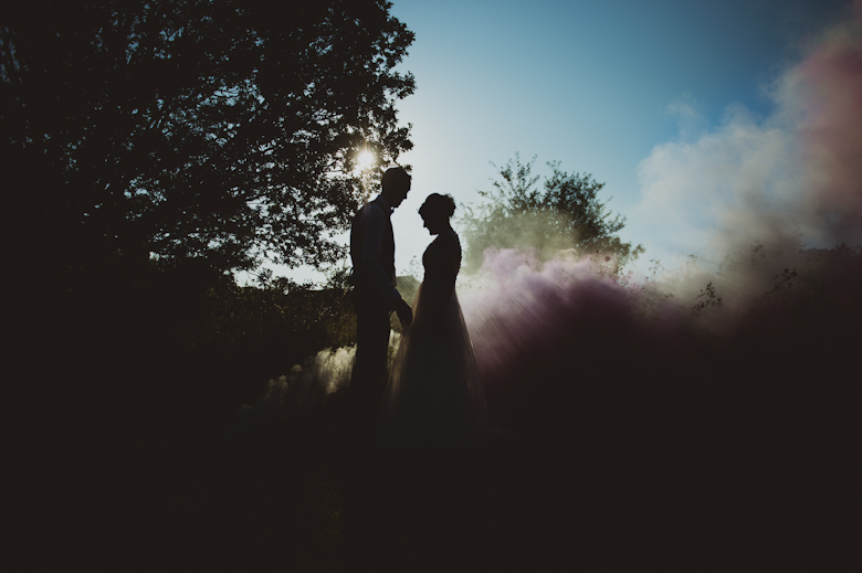 Smoke bombs at sunset time - wedding photo ideas uk - alternative wedding photographer