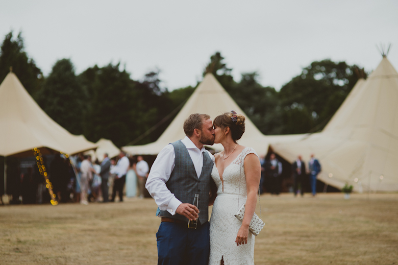 bride and groom kiss Vanstone Park Wedding festival