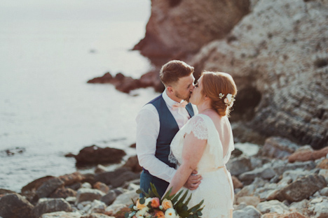 Outdoor Wedding Photography - Ibiza Wedding photography - Elixir venue Ibiza - bride groom kiss on the beach - Beach wedding photography