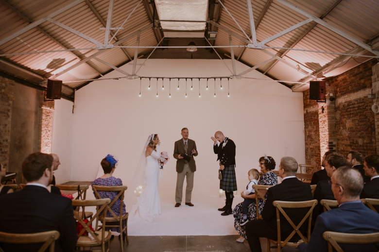 East London Shoreditch Wedding Photography - Shoreditch Studios Wedding Photographer - ceremony bride groom crying