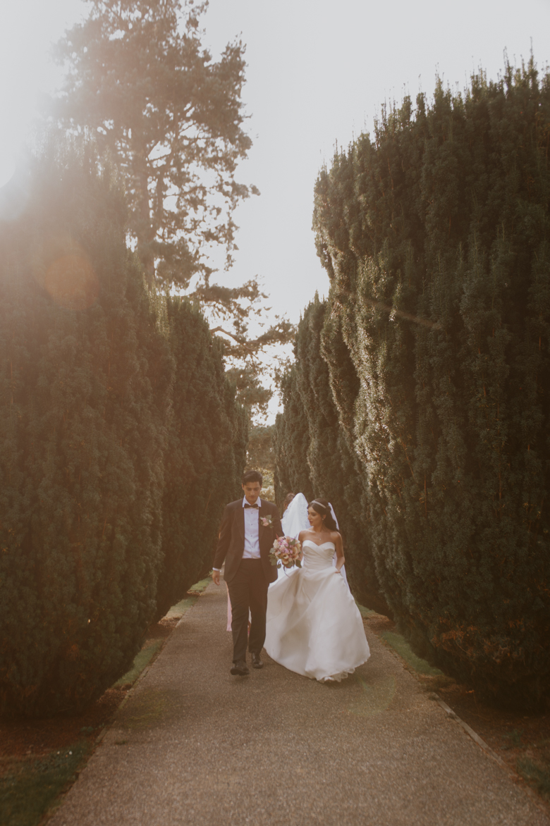 Iranian Wedding Photography London - The Grove Hotel Wedding Watford - bride and groom walking together