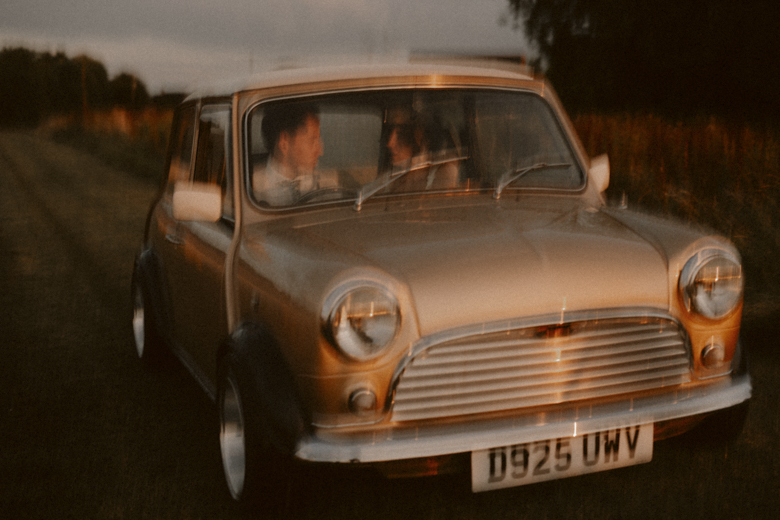 London Photographer Candid UK - couple in a mini